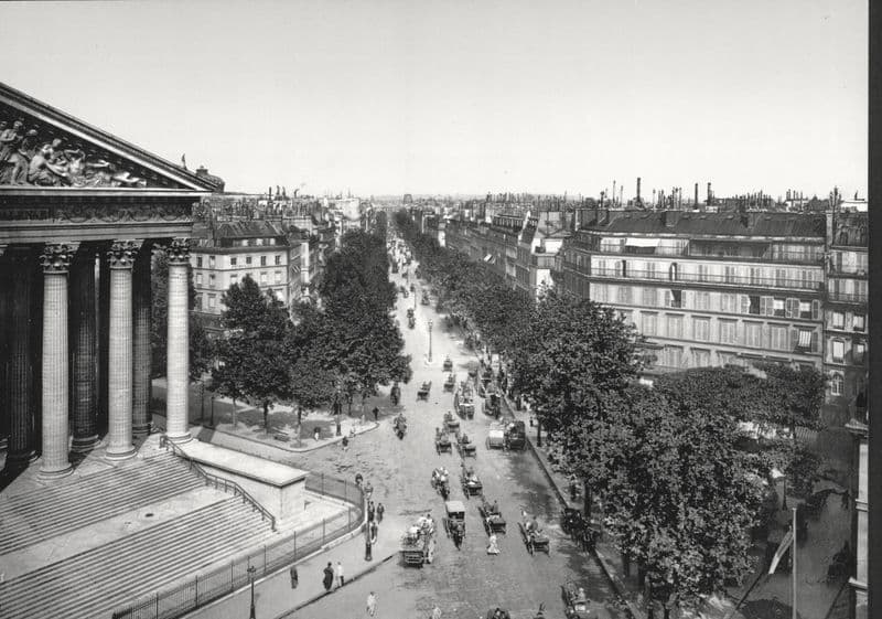 Boulevard de la Madeleine with café awnings and carriage traffic, Paris.